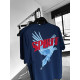SHORT-SLEEVED BLUE T-SHIRT WITH A PATTERN
