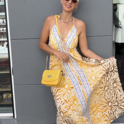 Yellow printed maxi dress with an open back
